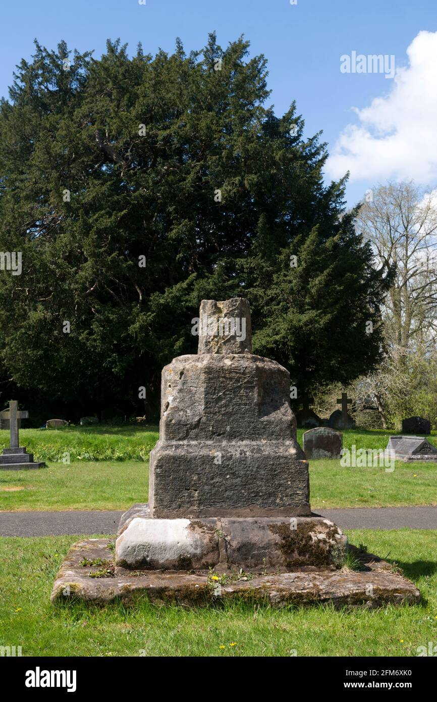 Remains of an old cross, St. Laurence`s churchyard, Alvechurch, Worcestershire, England, UK Stock Photo